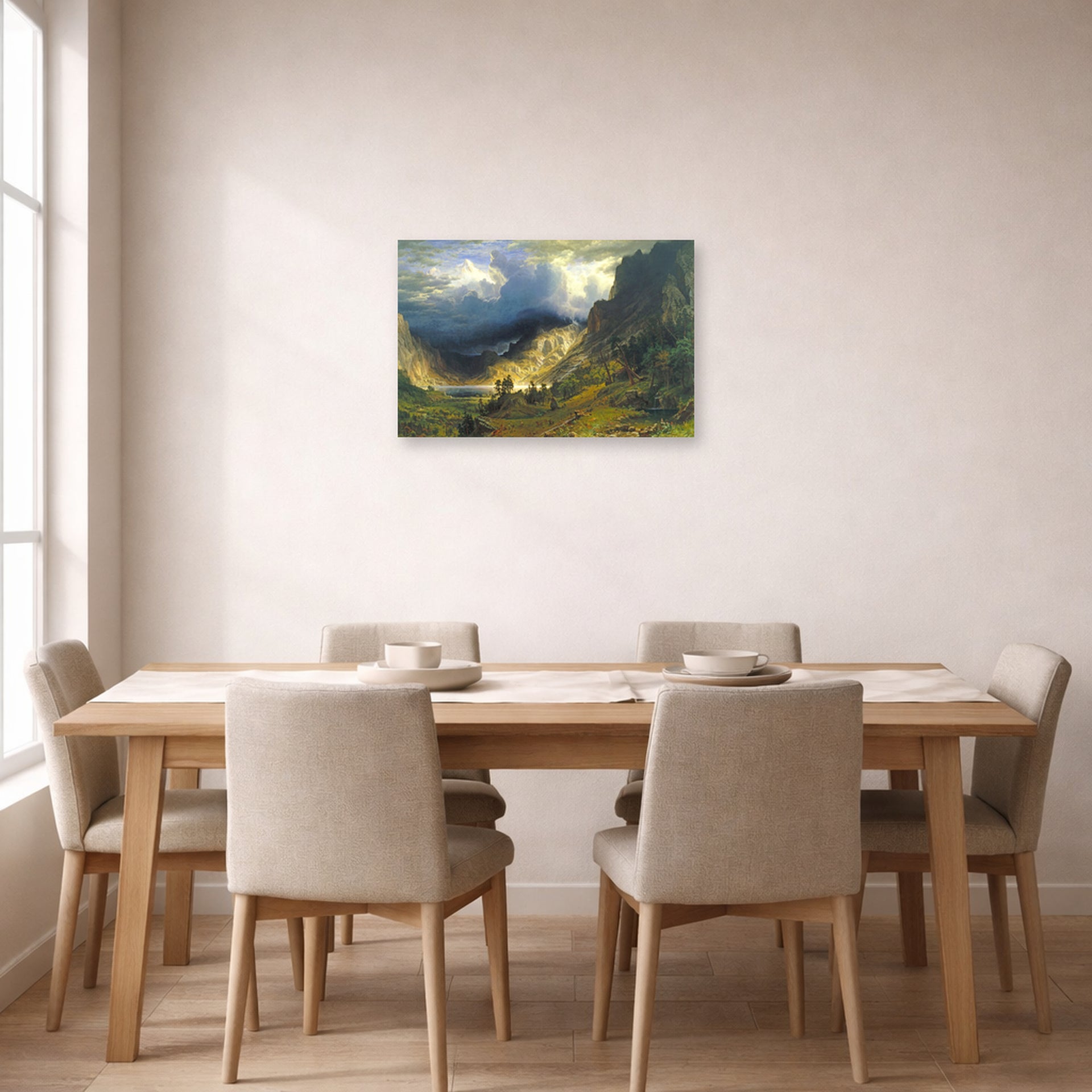 Unframed poster print of Albert Bierstadt's 'A Storm in the Rocky Mountains, Mt. Rosalie' displayed on a wall in a dining room