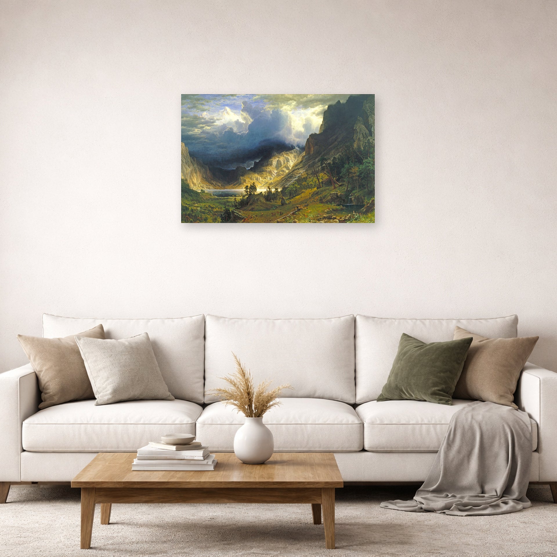 Unframed poster print of Albert Bierstadt's 'A Storm in the Rocky Mountains, Mt. Rosalie' displayed on a wall in a living room