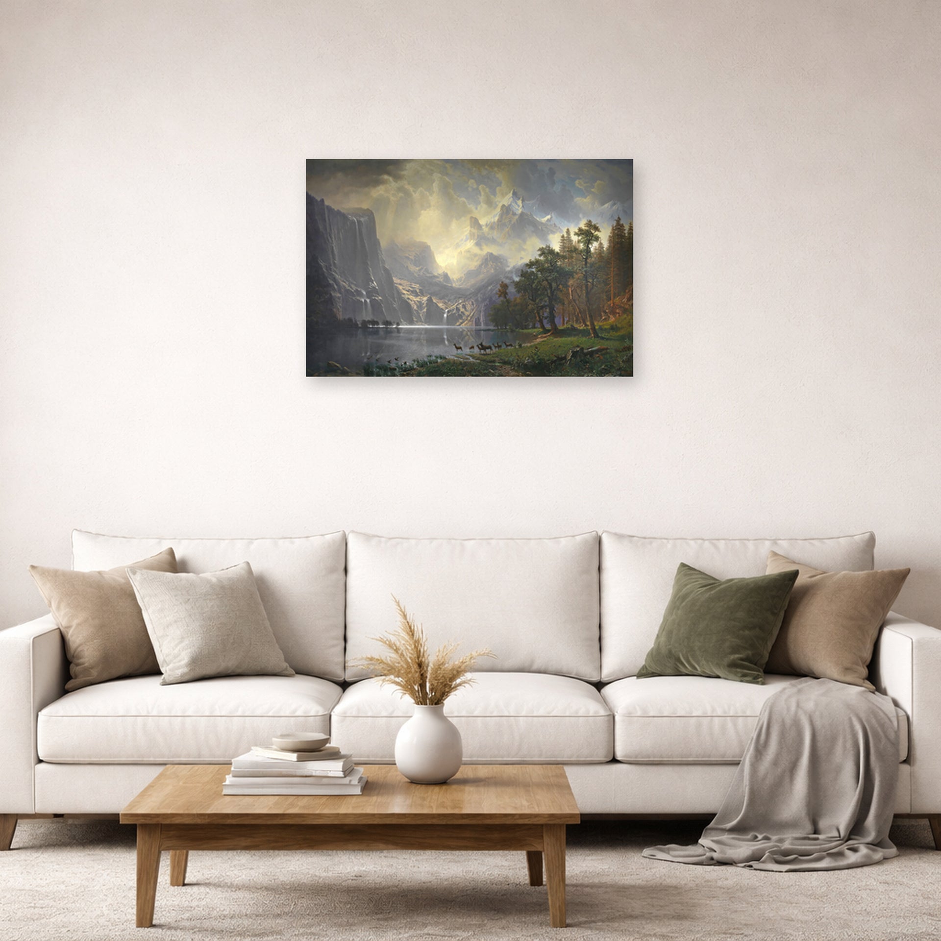 Unframed poster print of Albert Bierstadt's 'Among The Sierra Nevada Mountains' displayed on a wall in a living room
