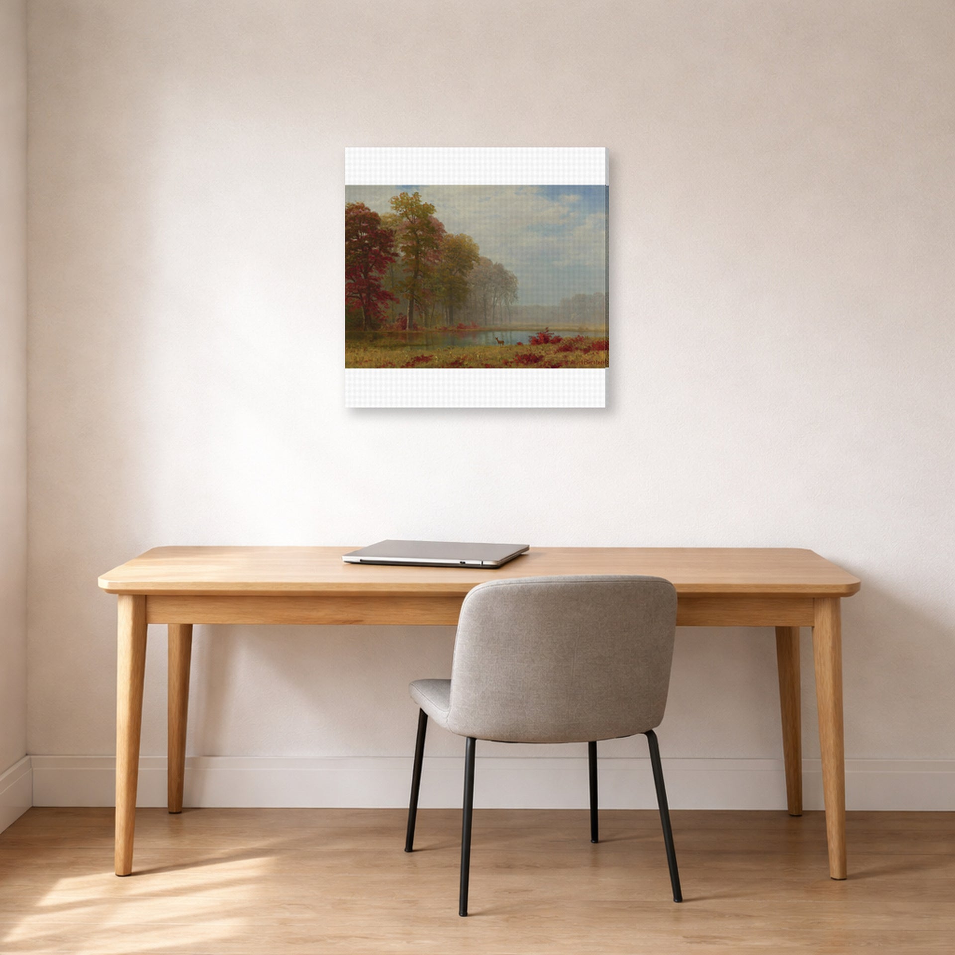 Gallery-wrapped canvas print of Albert Bierstadt's 'Autumn On The River' displayed on a wall in a office