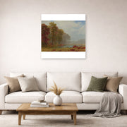 Unframed poster print of Albert Bierstadt's 'Autumn On The River' displayed on a wall in a living room