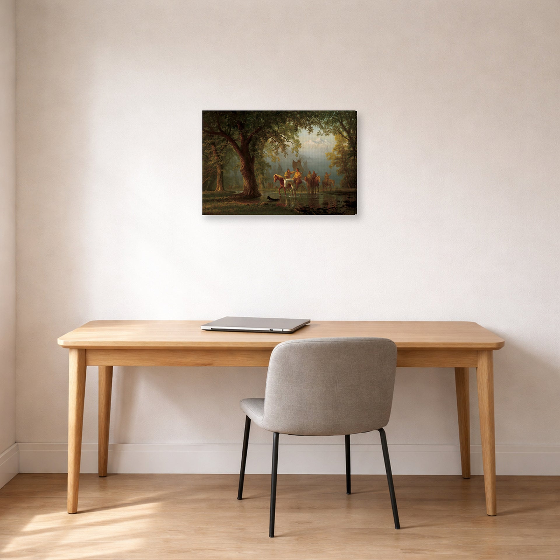 Gallery-wrapped canvas print of Albert Bierstadt's 'Departure of an Indian War Party' displayed on a wall in a office