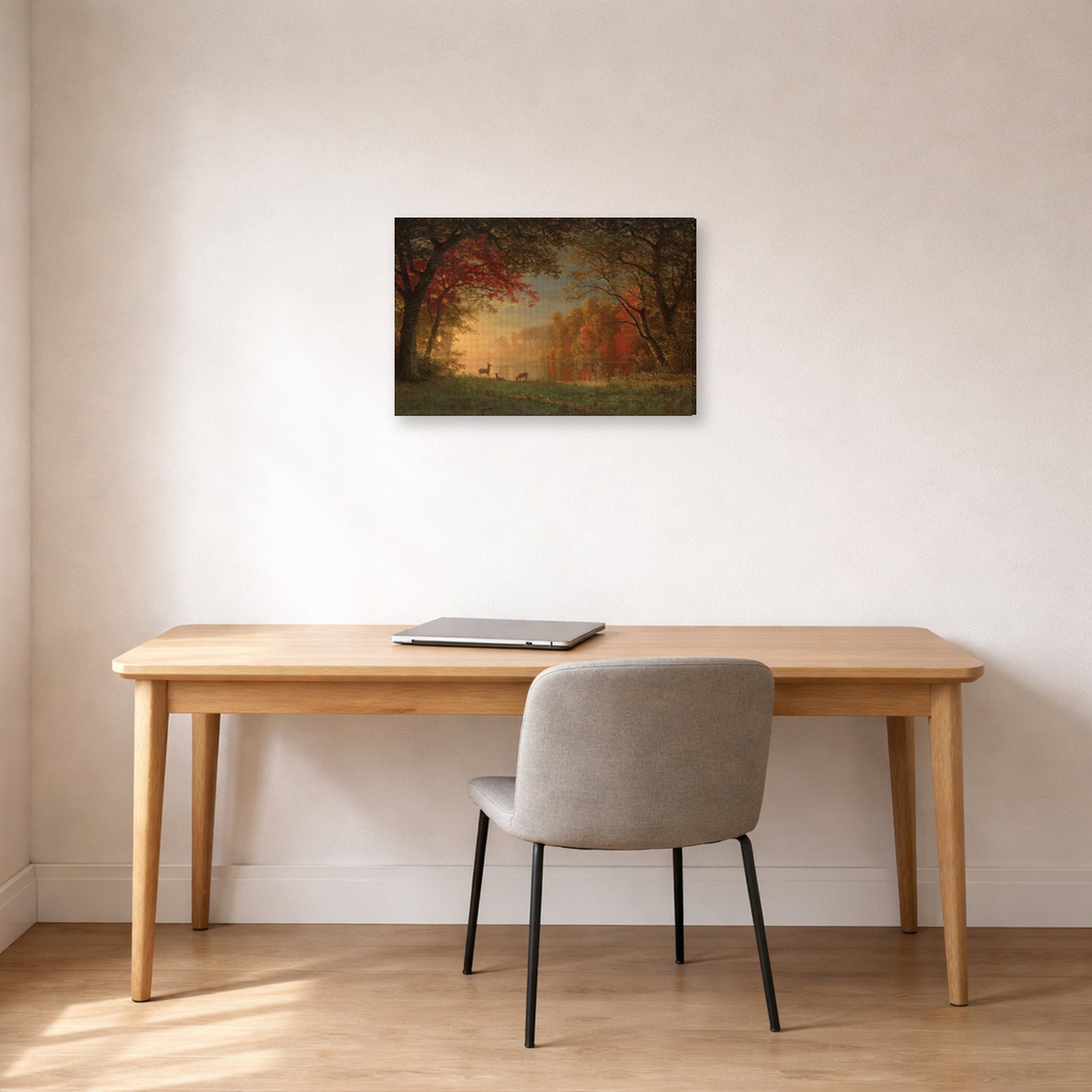 Gallery-wrapped canvas print of Albert Bierstadt's 'Indian Sunset: Deer by a Lake' displayed on a wall in a office
