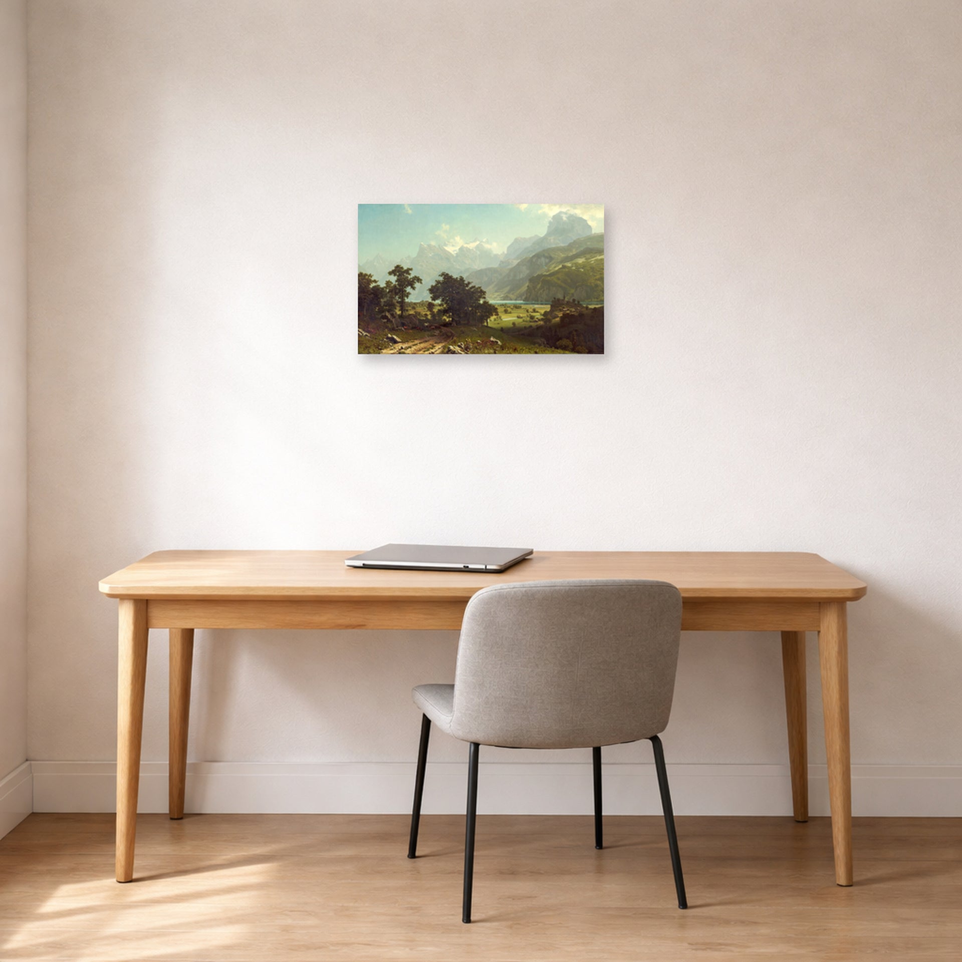 Unframed poster print of Albert Bierstadt's 'Lake Lucerne' displayed on a wall in a office