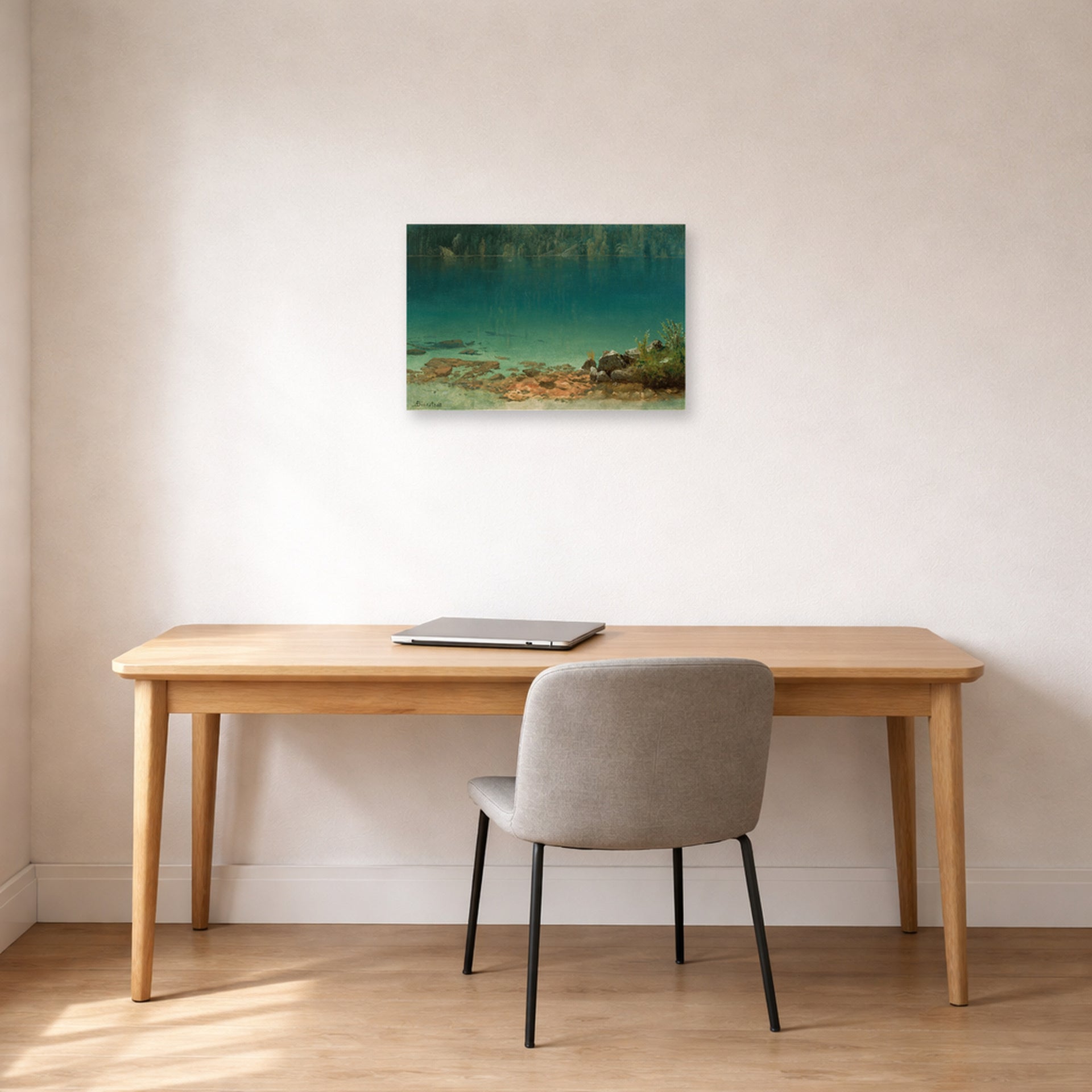 Unframed poster print of Albert Bierstadt's 'Lake Scene' displayed on a wall in a office