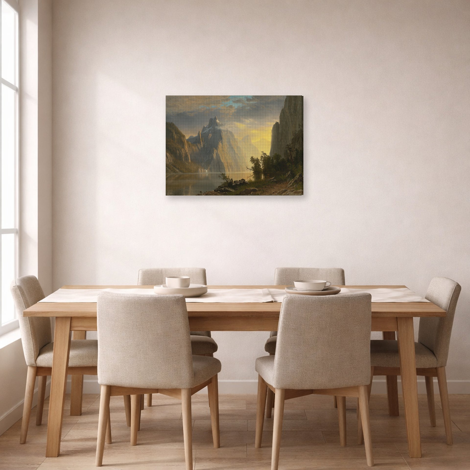 Gallery-wrapped canvas print of Albert Bierstadt's 'Lake in the Sierra Nevada' displayed on a wall in a dining room
