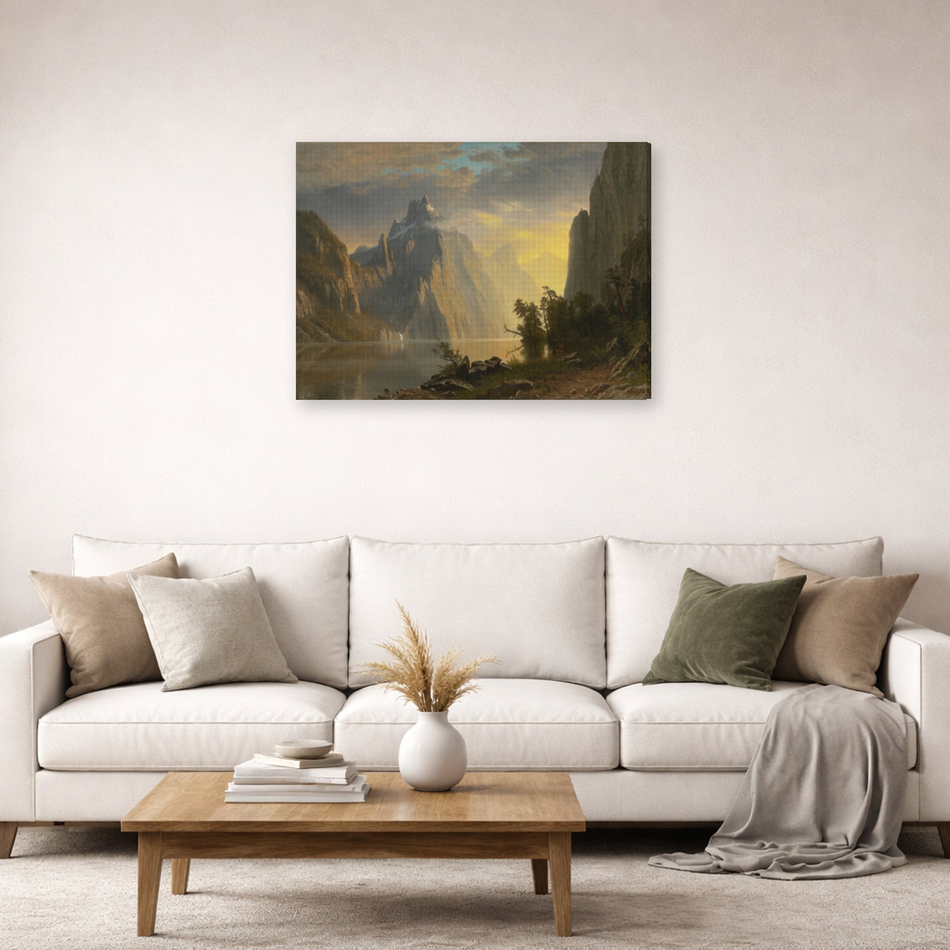 Gallery-wrapped canvas print of Albert Bierstadt's 'Lake in the Sierra Nevada' displayed on a wall in a living room
