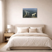 Gallery-wrapped canvas print of Albert Bierstadt's 'Mountain Goats' displayed on a wall in a bedroom