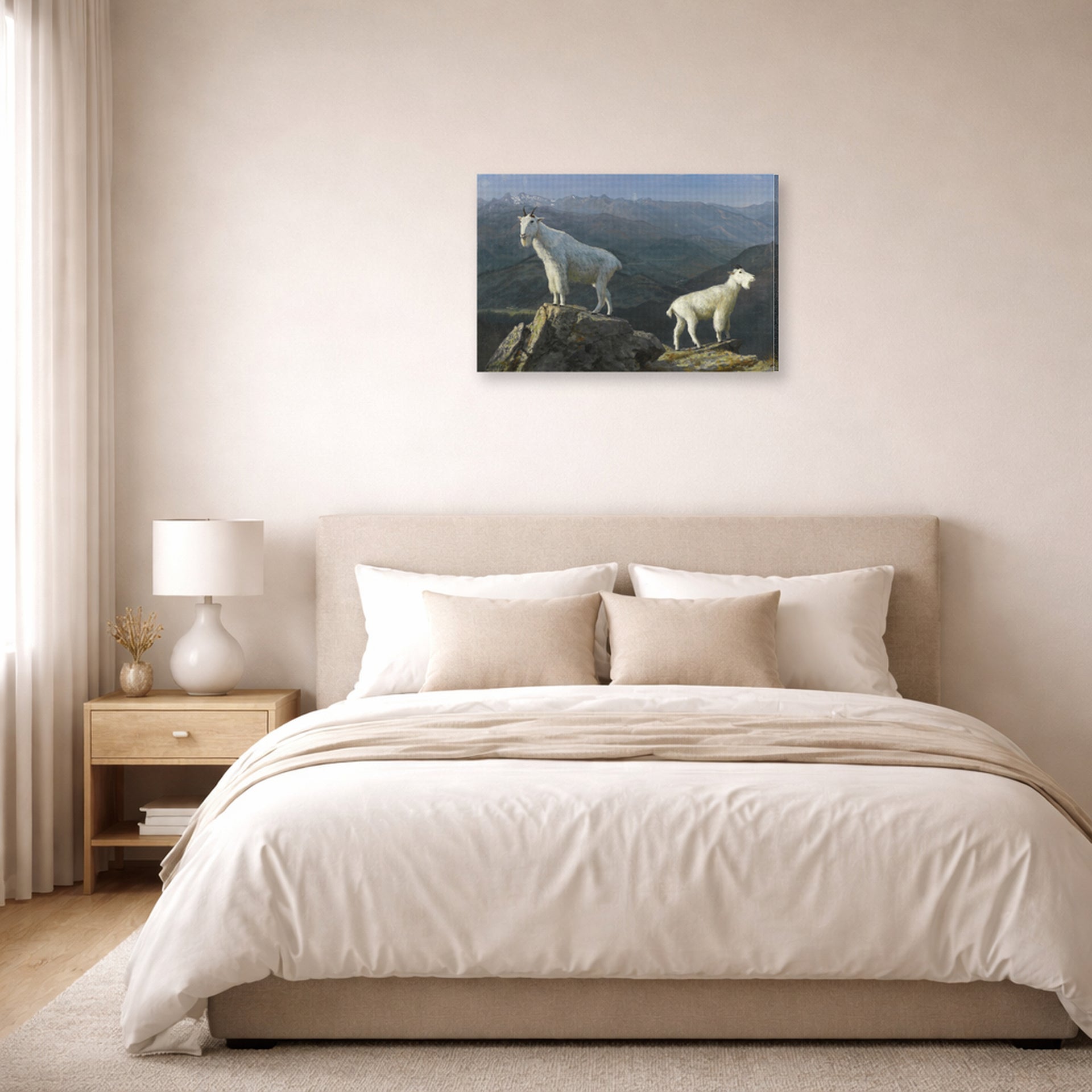Gallery-wrapped canvas print of Albert Bierstadt's 'Mountain Goats' displayed on a wall in a bedroom