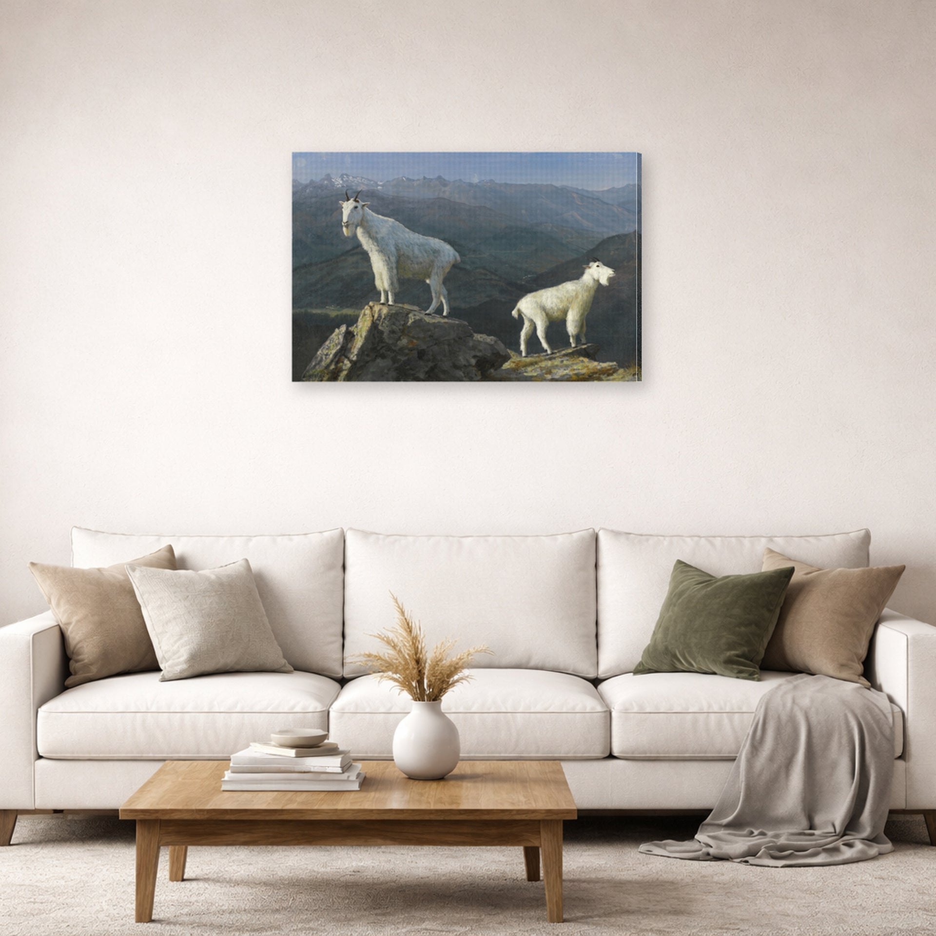 Gallery-wrapped canvas print of Albert Bierstadt's 'Mountain Goats' displayed on a wall in a living room