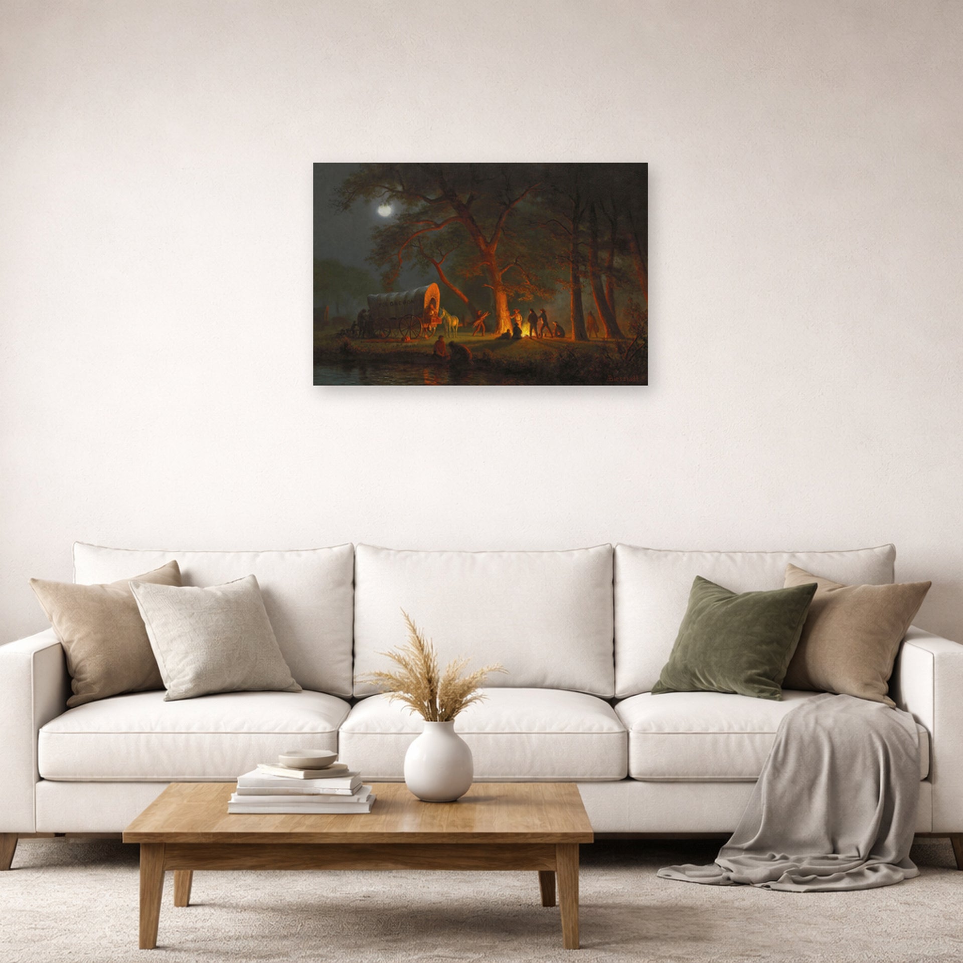 Unframed poster print of Albert Bierstadt's 'Oregon Trail' displayed on a wall in a living room