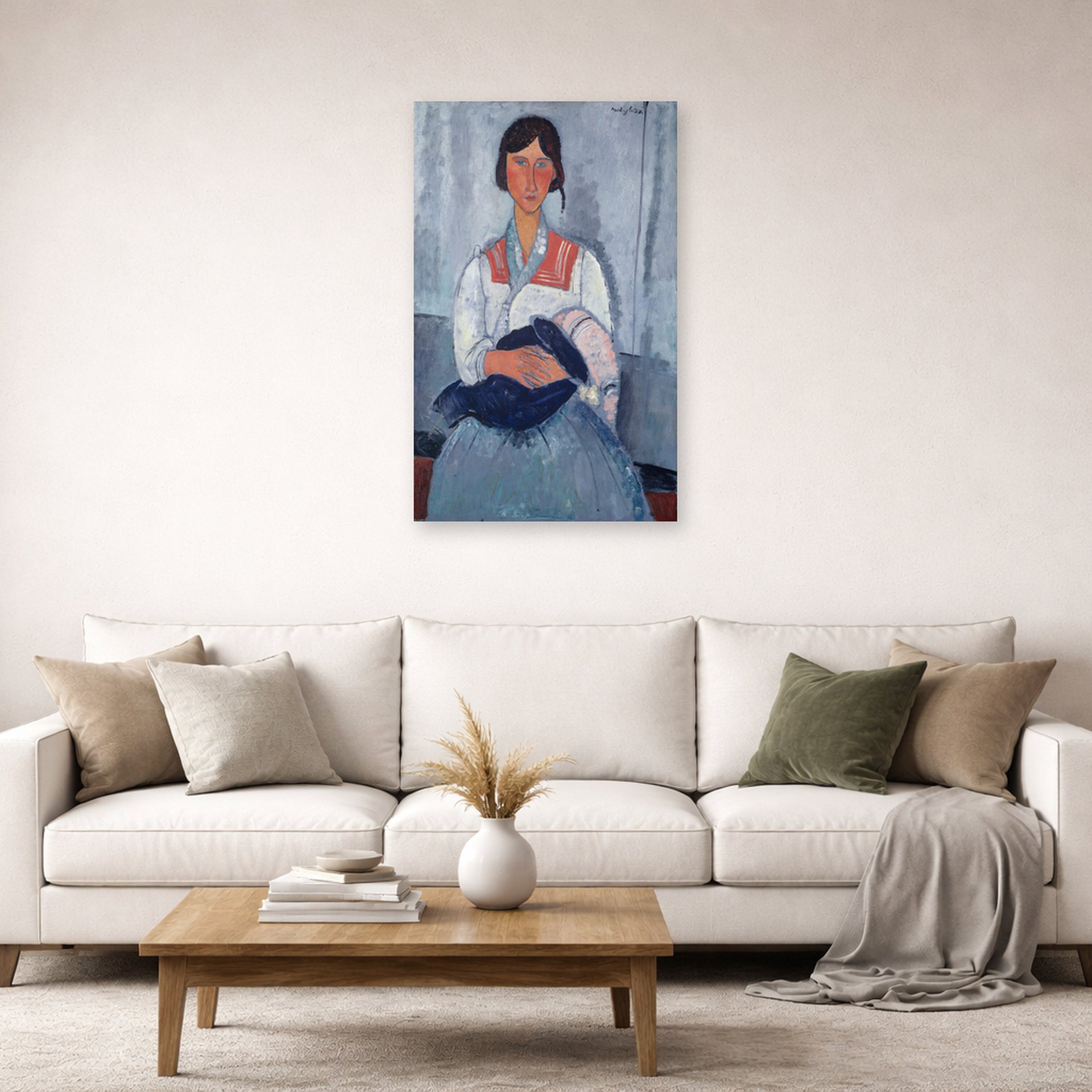 Unframed poster print of Amedeo Modigliani's Gypsy Woman with Baby displayed on a wall in a second living room setting