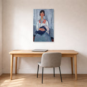 Unframed poster print of Amedeo Modigliani's Gypsy Woman with Baby displayed on a wall in an office