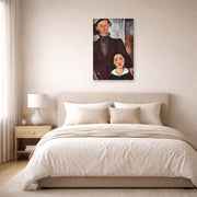 Unframed poster print of Amedeo Modigliani's Jacques and Berthe Lipchitz displayed on a wall in a bedroom