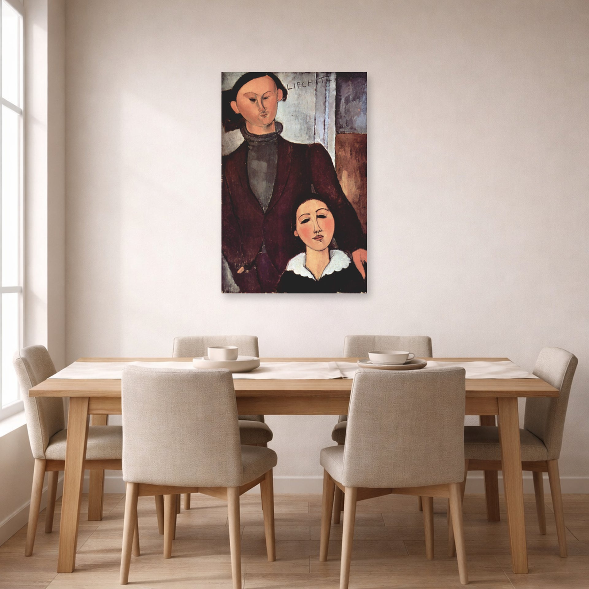 Unframed poster print of Amedeo Modigliani's Jacques and Berthe Lipchitz displayed on a wall in a dining room