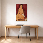 Gallery-wrapped canvas print of Amedeo Modigliani's Nude Sitting on a Divan (La Belle Romaine) displayed on a wall in an office