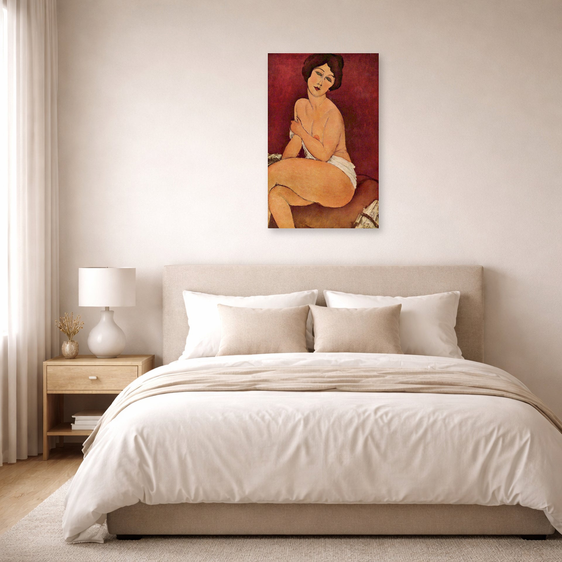 Unframed poster print of Amedeo Modigliani's Nude Sitting on a Divan (La Belle Romaine) displayed on a wall in a bedroom