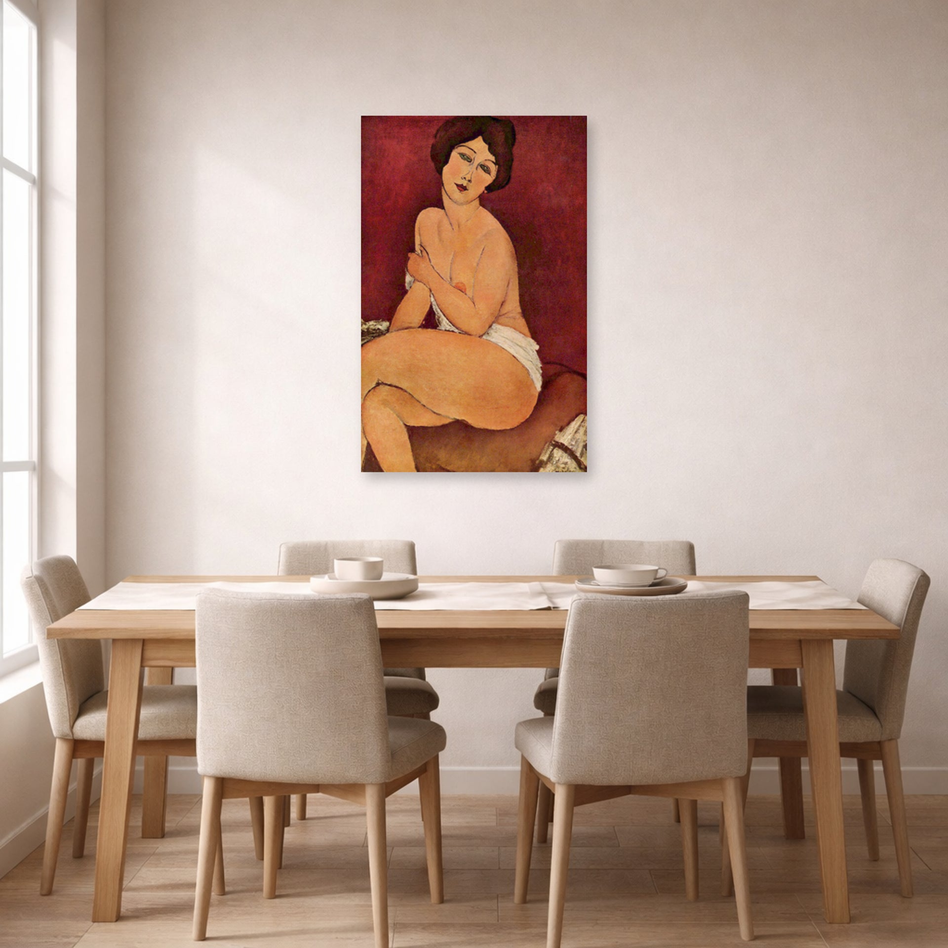 Unframed poster print of Amedeo Modigliani's Nude Sitting on a Divan (La Belle Romaine) displayed on a wall in a dining room
