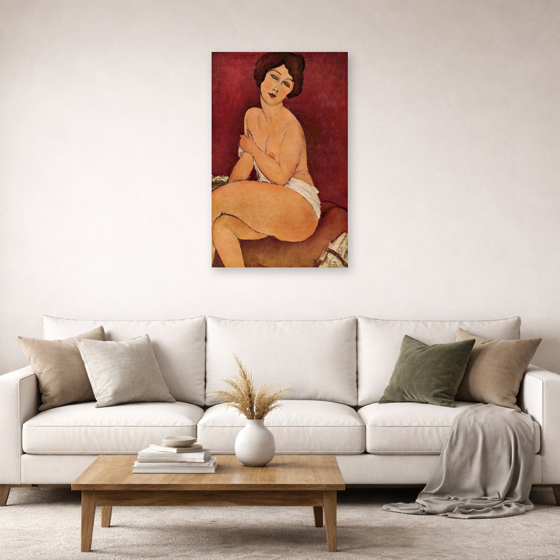 Unframed poster print of Amedeo Modigliani's Nude Sitting on a Divan (La Belle Romaine) displayed on a wall in a second living room setting
