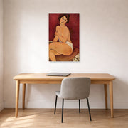 Unframed poster print of Amedeo Modigliani's Nude Sitting on a Divan (La Belle Romaine) displayed on a wall in an office