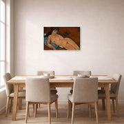 Gallery-wrapped canvas print of Amedeo Modigliani's Nude on a Blue Cushion displayed on a wall in a dining room