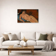 Gallery-wrapped canvas print of Amedeo Modigliani's Nude on a Blue Cushion displayed on a wall in a second living room setting