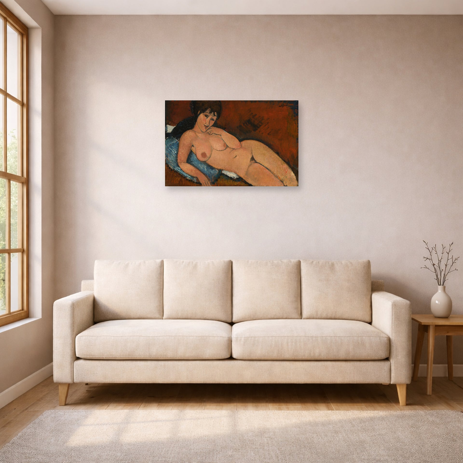 Unframed poster print of Amedeo Modigliani's Nude on a Blue Cushion displayed on a wall in a living room
