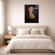 Gallery-wrapped canvas print of Amedeo Modigliani's Portrait of Jeanne Hebuterne displayed on a wall in a bedroom