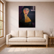 Gallery-wrapped canvas print of Amedeo Modigliani's Portrait of Jeanne Hebuterne displayed on a wall in a living room