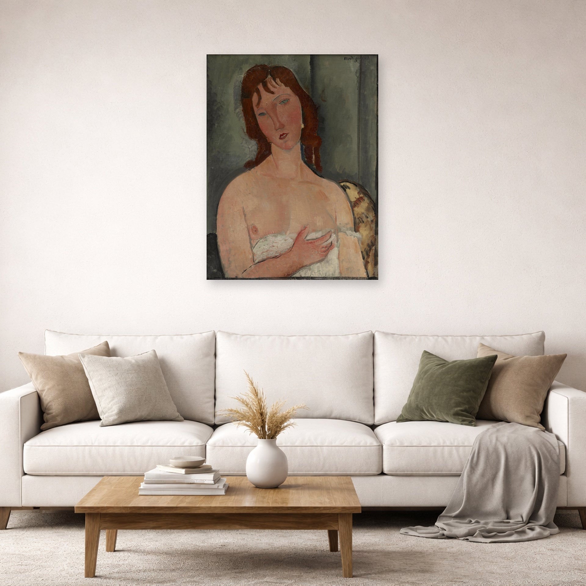 Unframed poster print of Amedeo Modigliani's Portrait of a Young Woman displayed on a wall in a second living room setting