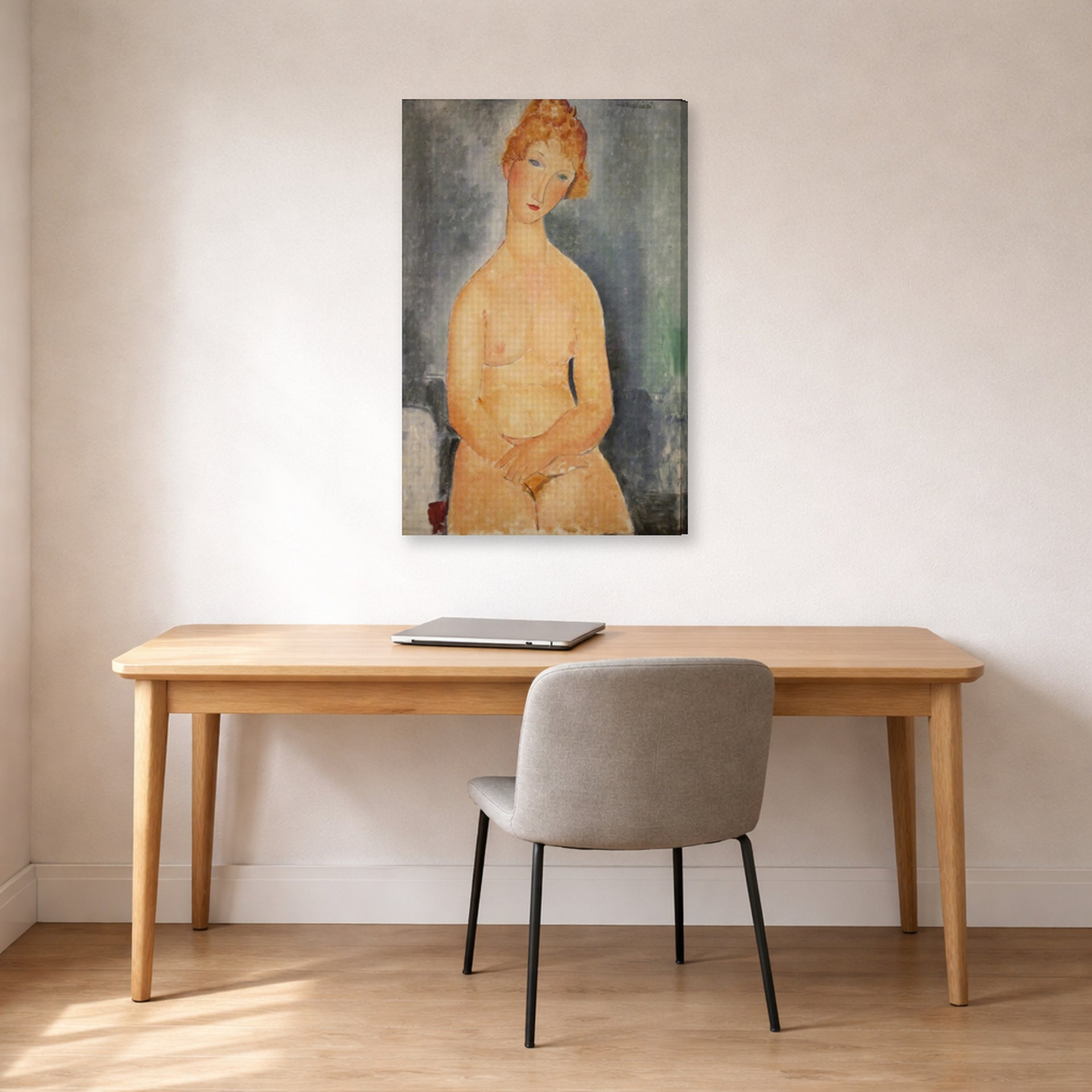 Gallery-wrapped canvas print of Amedeo Modigliani's Seated Nude displayed on a wall in an office