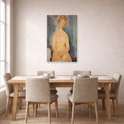 Unframed poster print of Amedeo Modigliani's Seated Nude displayed on a wall in a dining room