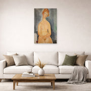 Unframed poster print of Amedeo Modigliani's Seated Nude displayed on a wall in a second living room setting