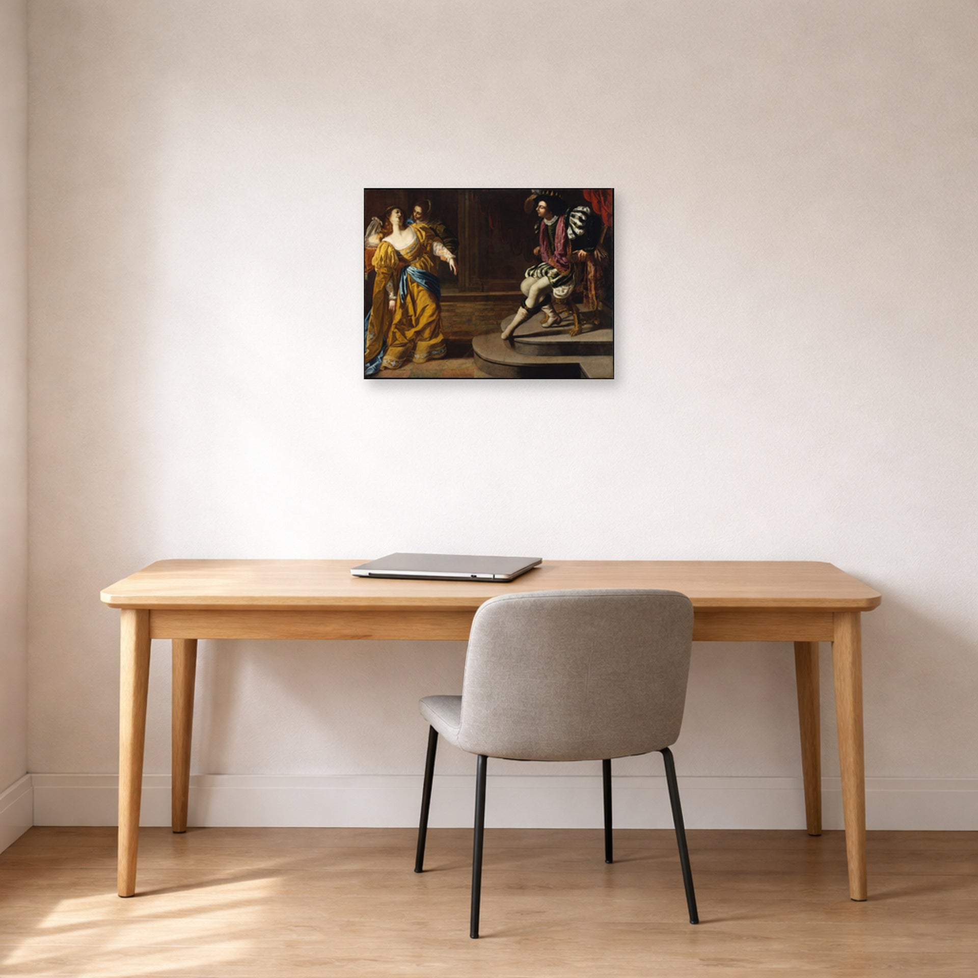 Unframed poster print of Artemisia Gentileschi's Esther before Ahasuerus displayed on a wall in a home office