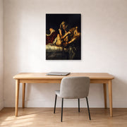 Gallery-wrapped canvas print of Artemisia Gentileschi's Judith Slaying Holofernes displayed on a wall in a home office