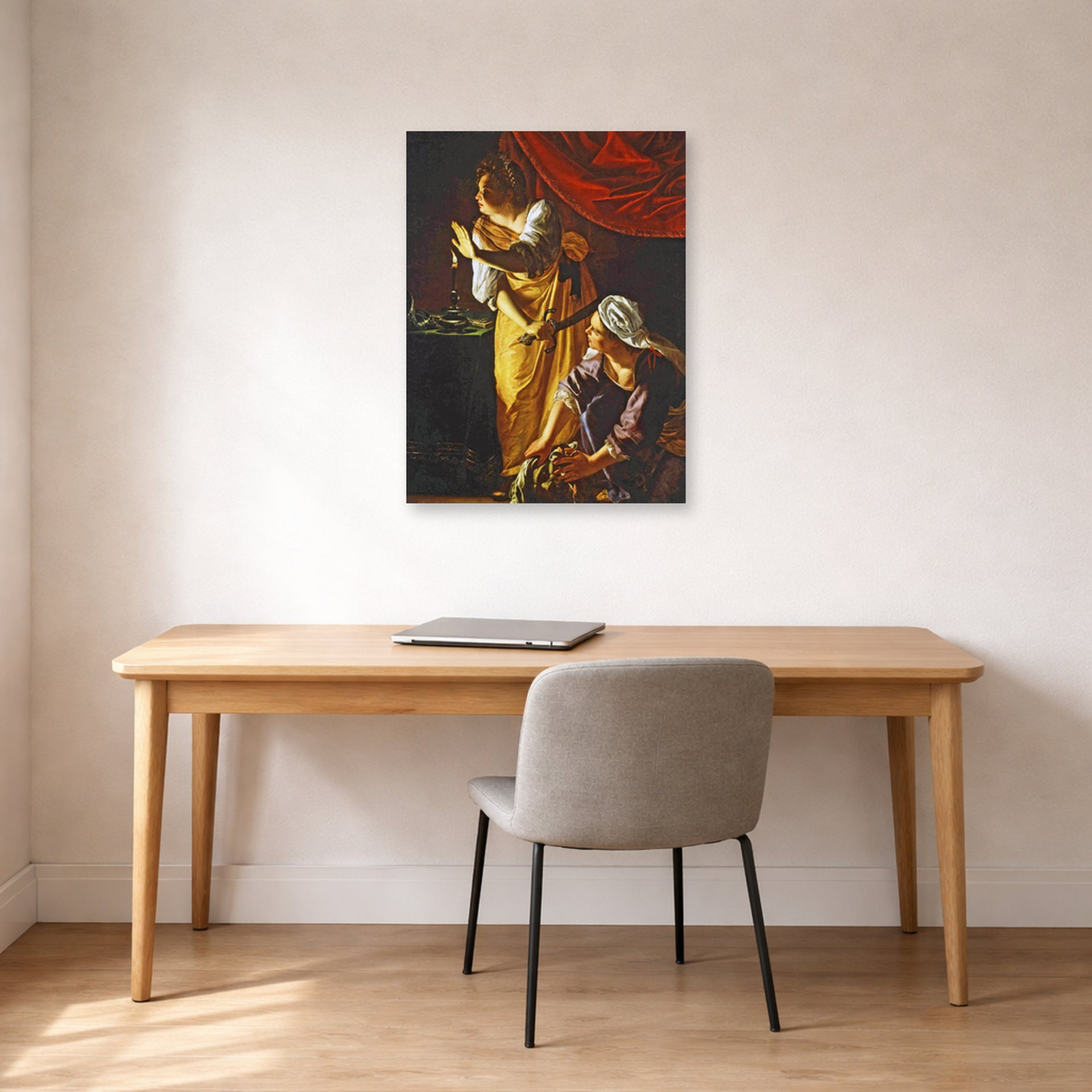 Unframed poster print of Artemisia Gentileschi's Judith with the head of Holofernes displayed on a wall in a home office