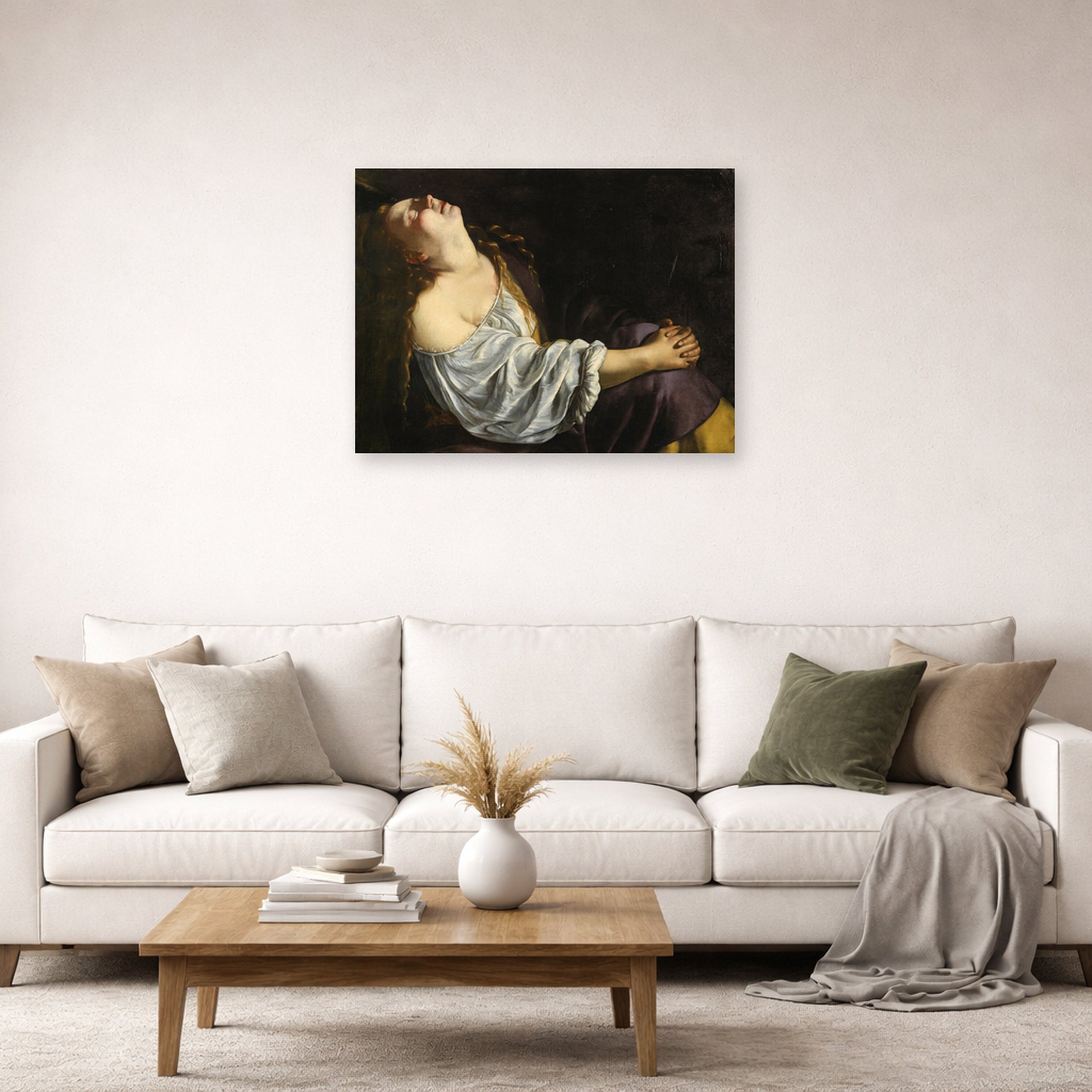 Unframed poster print of Artemisia Gentileschi's Mary Magdalene In Ecstasy displayed on a wall in a living room