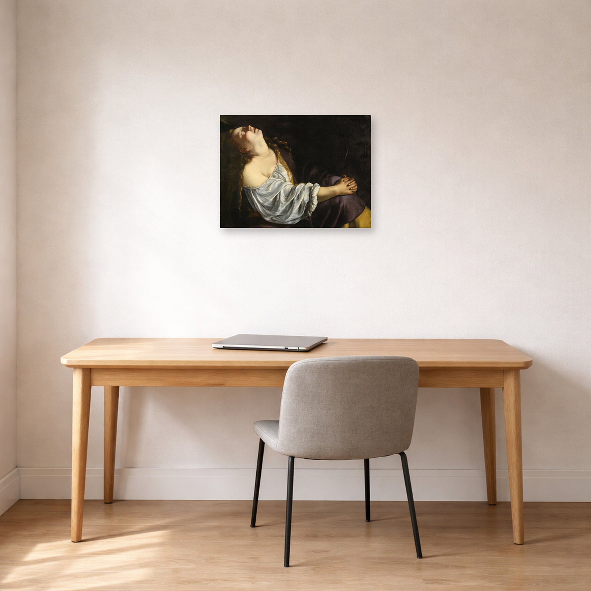 Unframed poster print of Artemisia Gentileschi's Mary Magdalene In Ecstasy displayed on a wall in a home office