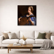 Unframed poster print of Artemisia Gentileschi's Self Portrait as a Lute Player displayed on a wall in a living room