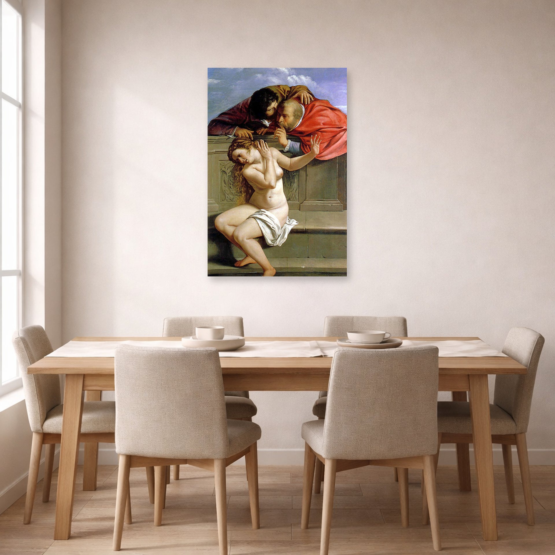 Unframed poster print of Artemisia Gentileschi's Susanna and the Elders displayed on a wall in a dining room