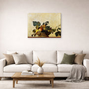Gallery-wrapped canvas print of Caravaggio's 'Basket of Fruit' displayed on a wall in a living room