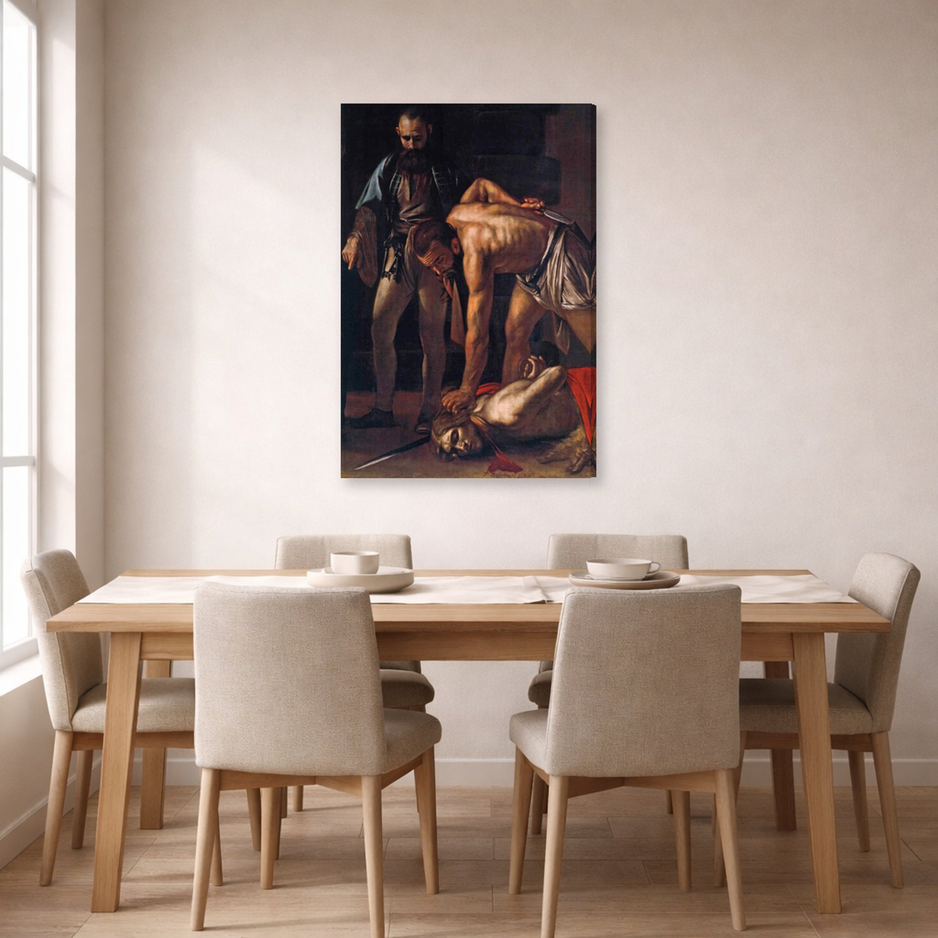 Gallery-wrapped canvas print of Caravaggio's 'Beheading of Saint John the Baptist' displayed on a wall in a dining room