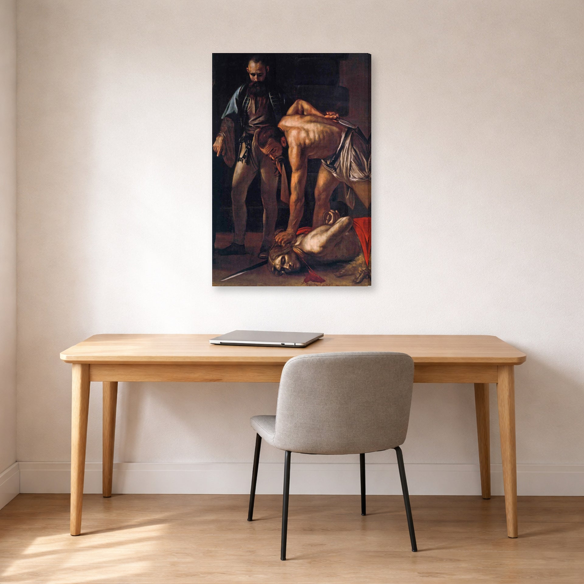 Gallery-wrapped canvas print of Caravaggio's 'Beheading of Saint John the Baptist' displayed on a wall in an office