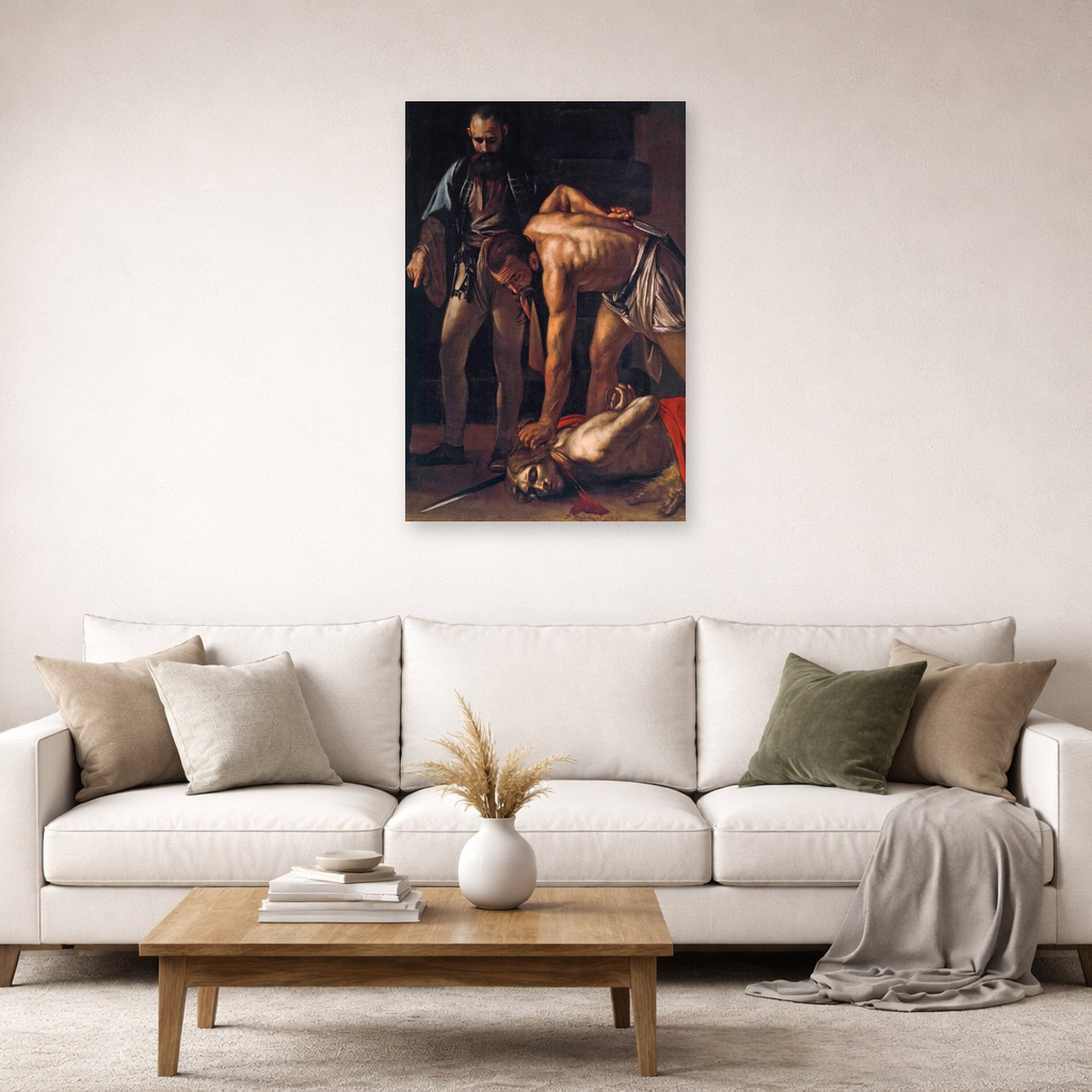 Unframed poster print of Caravaggio's 'Beheading of Saint John the Baptist' displayed on a wall in a living room