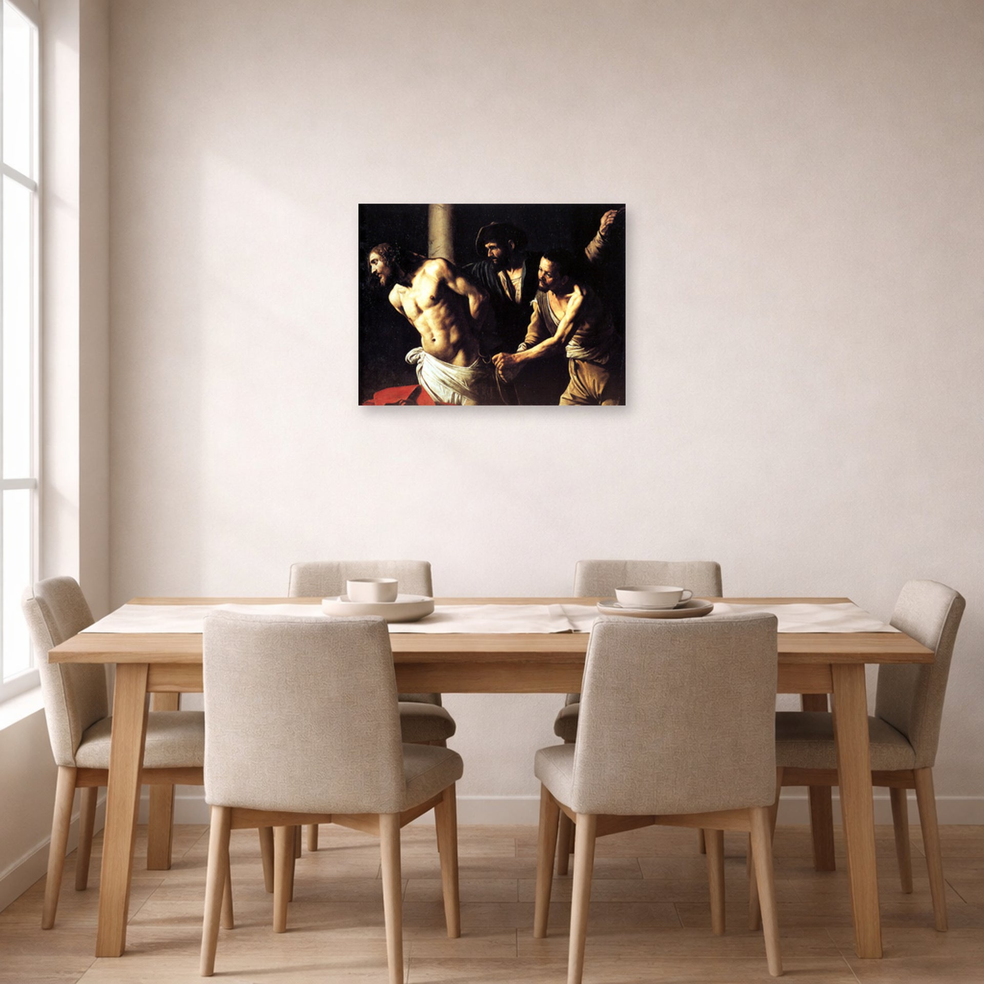 Unframed poster print of Caravaggio's 'Christ of the Column' displayed on a wall in a dining room