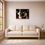 Unframed poster print of Caravaggio's 'Christ of the Column' displayed on a wall in a living room