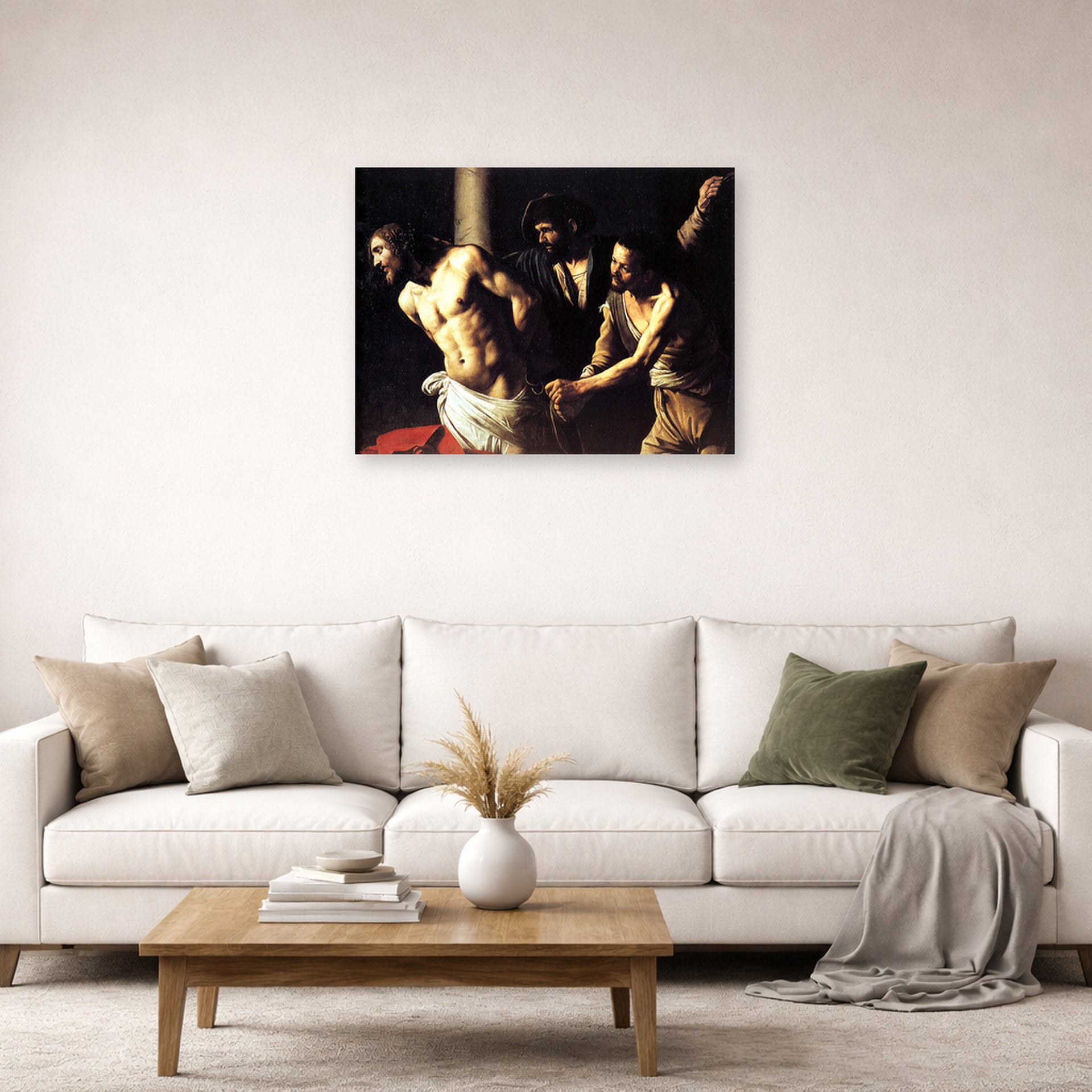 Unframed poster print of Caravaggio's 'Christ of the Column' displayed on a wall in a living room