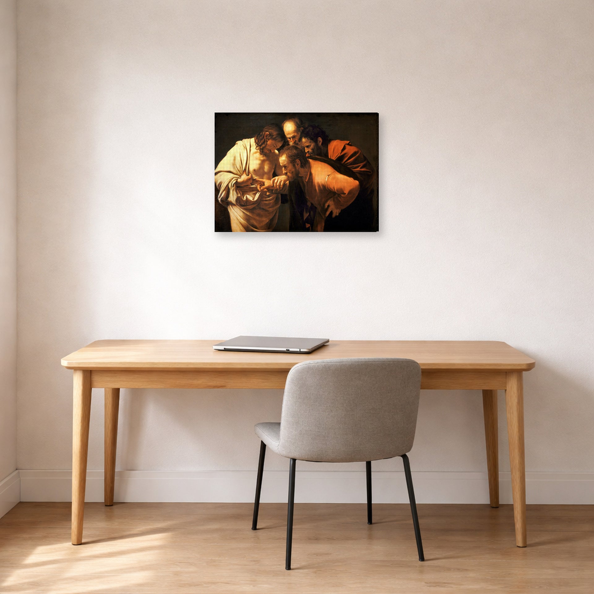 Gallery-wrapped canvas print of Caravaggio's 'Doubting of St.Thomas' displayed on a wall in an office