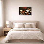 Gallery-wrapped canvas print of Caravaggio's 'Judith Beheading Holofernes' displayed on a wall in a bedroom