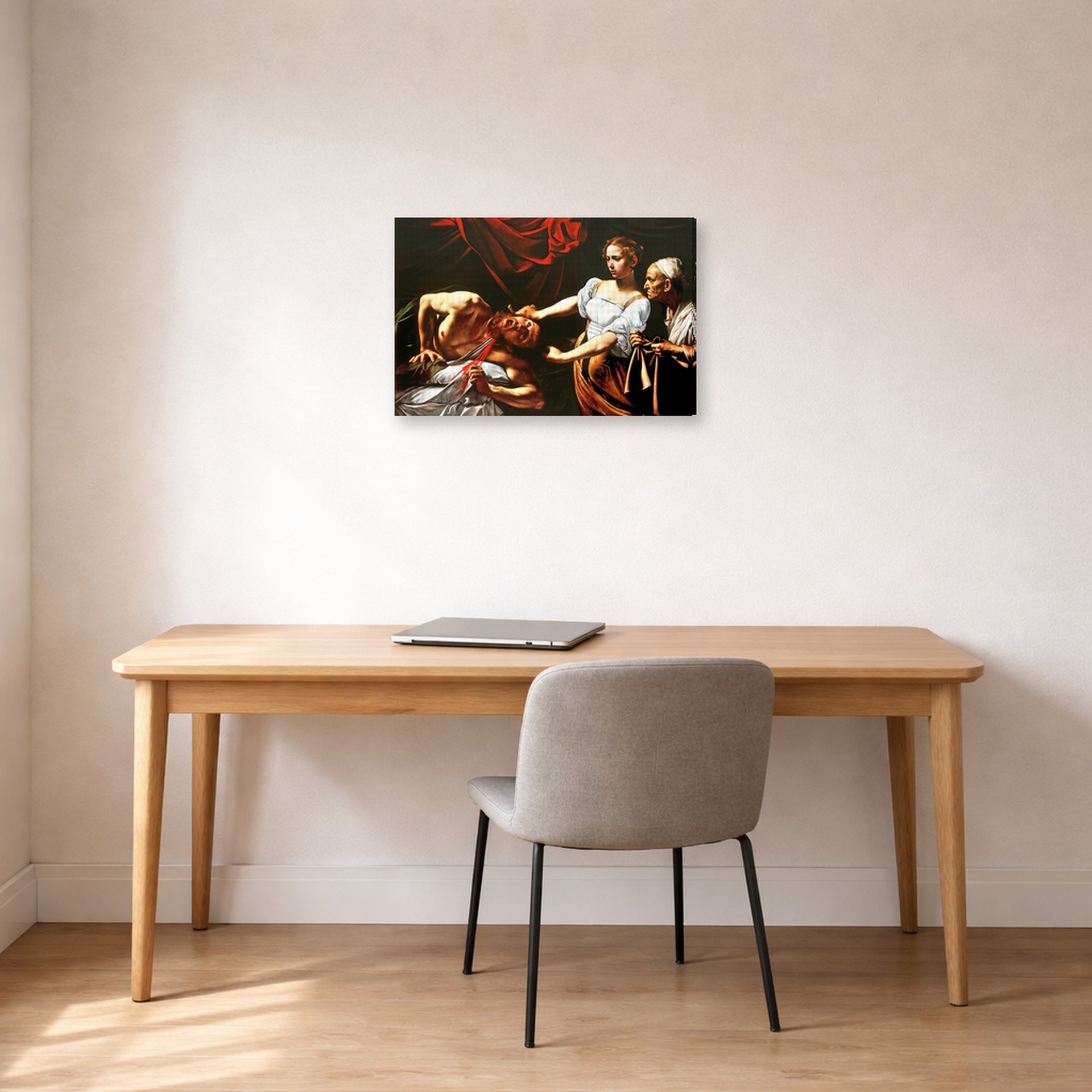 Gallery-wrapped canvas print of Caravaggio's 'Judith Beheading Holofernes' displayed on a wall in an office